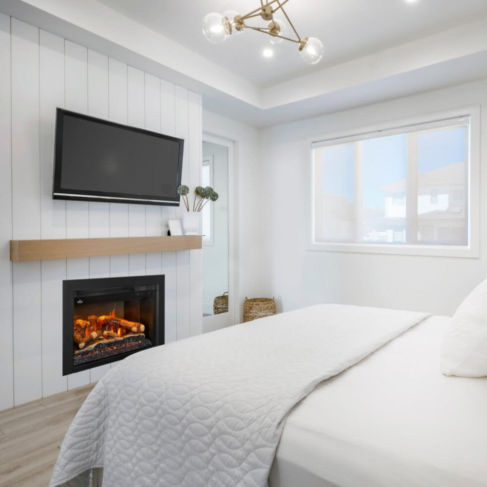 Black electric fireplace insert installed in a white mantel with viewing screen