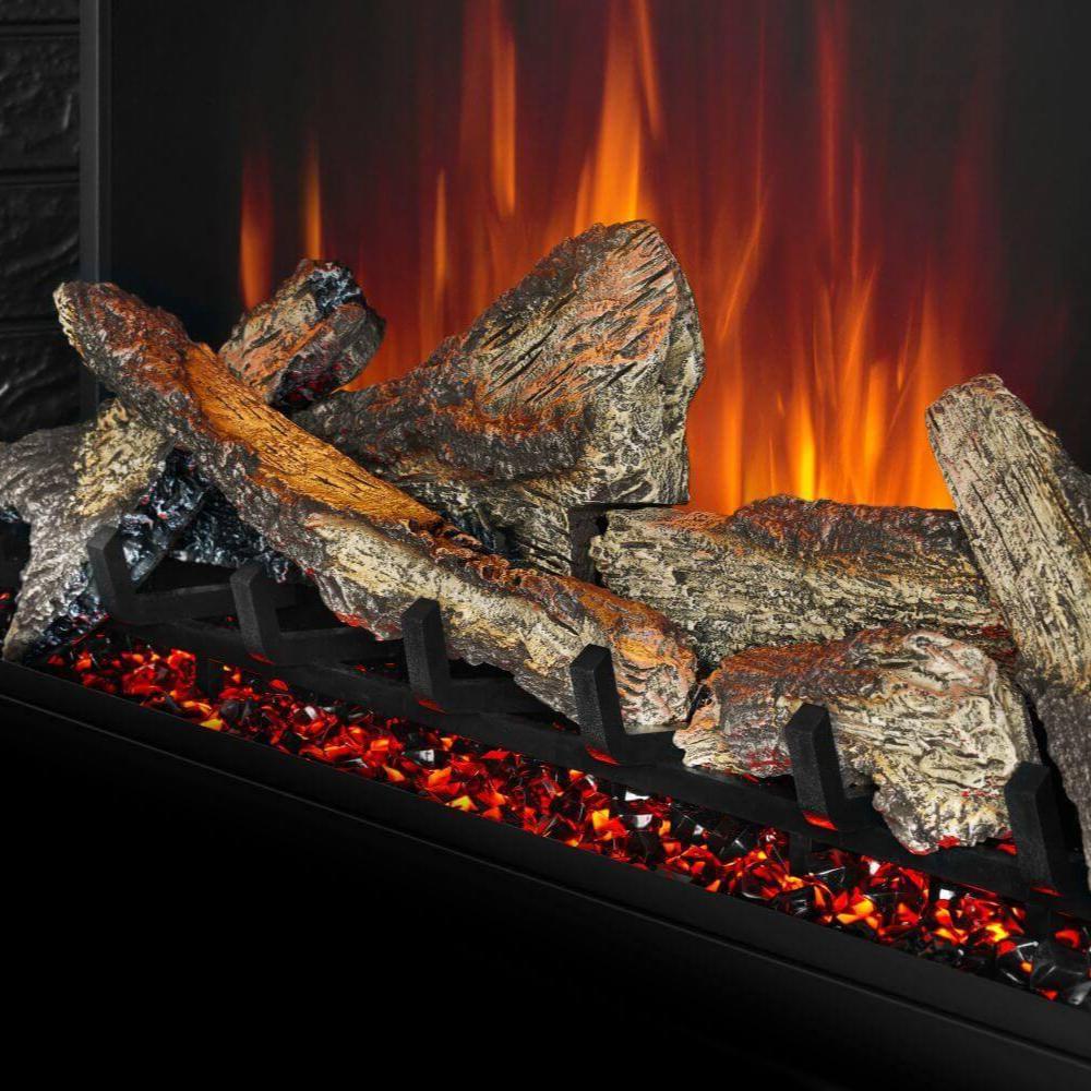 Close-up of faux logs with bright orange flame effect in an electric fireplace