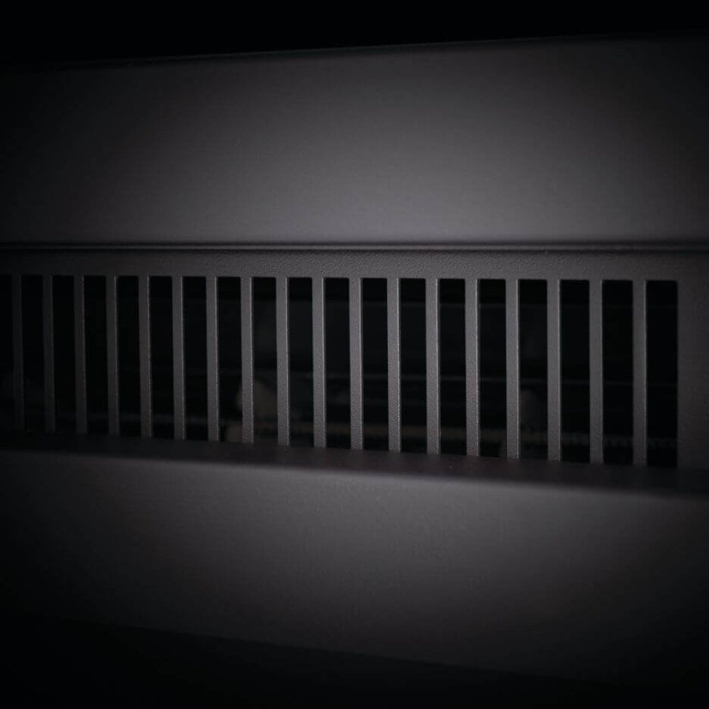 Electric fireplace vent grille along the front panel