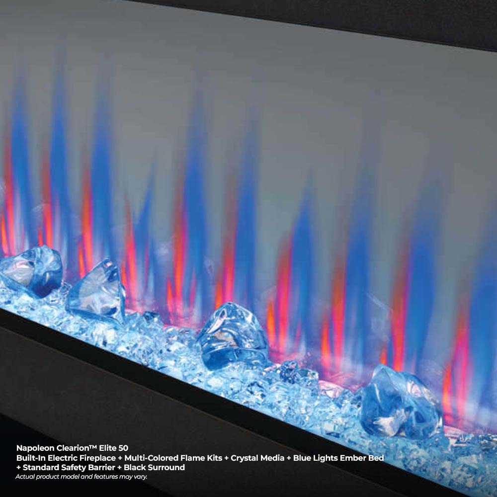 Close-up of see-through electric fireplace flame effect with blue crystal media and glowing logs
