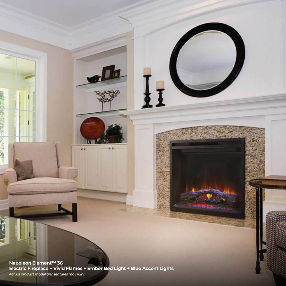 Built-in electric fireplace with flame effect installed in a white stone surround