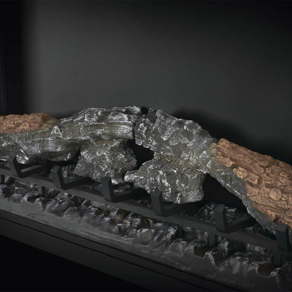 Faux log and ember bed inside built-in electric fireplace with dark interior