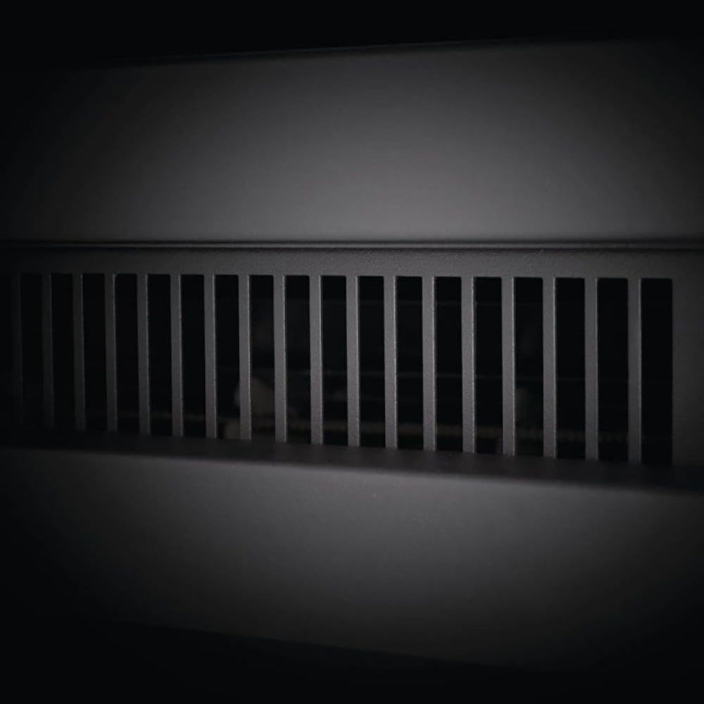 Air vent grille inside electric fireplace, shown from a close side angle