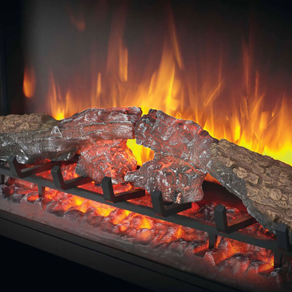 Close-up of glowing embers and faux logs in an electric fireplace flame effect
