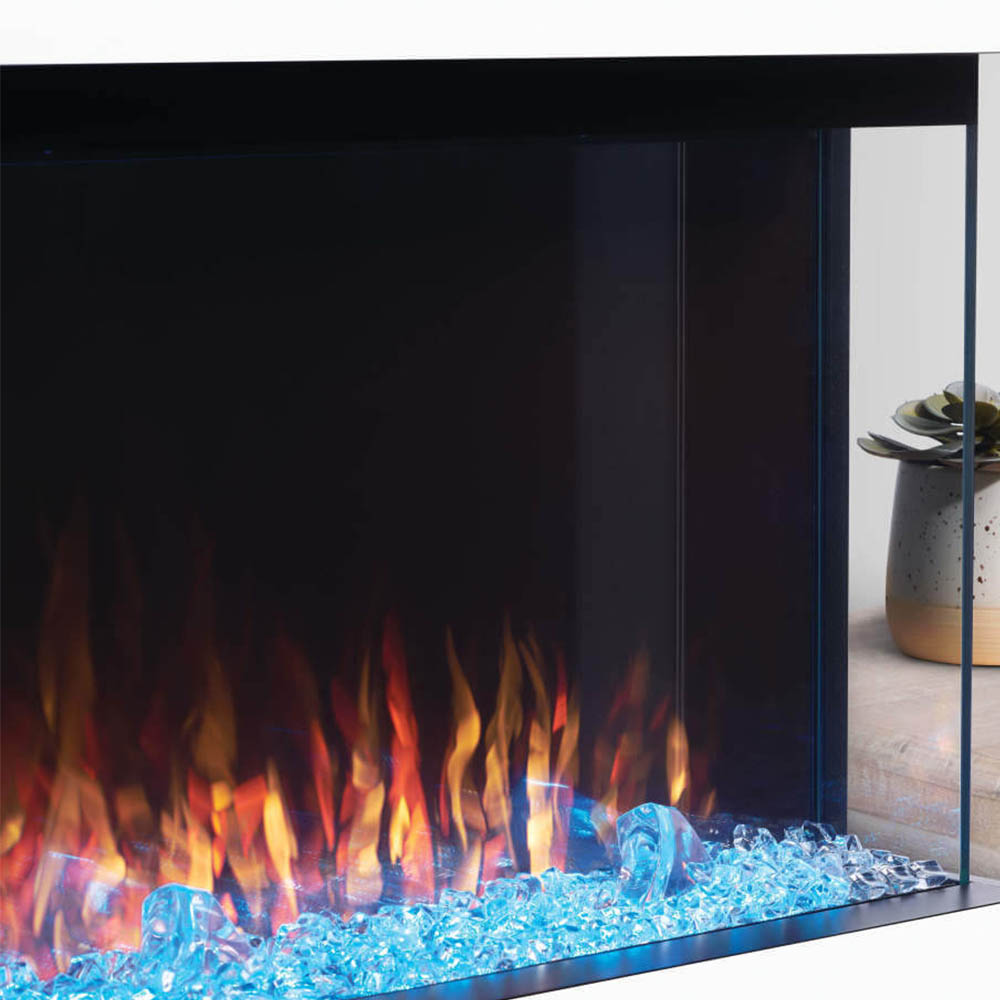 3-sided electric fireplace close-up showing flames and blue crystal-like ember bed