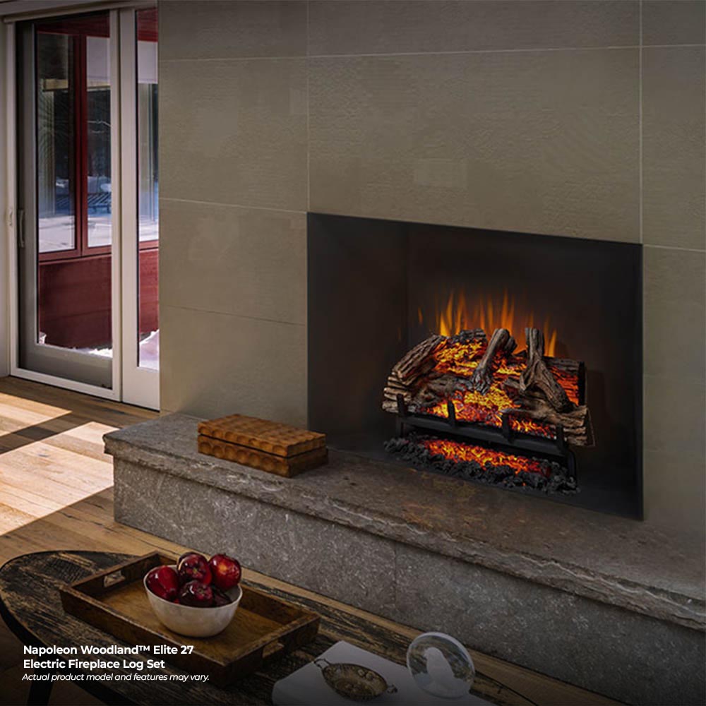 Electric fireplace log set in a stone wall fireplace, orange flame with ember glow