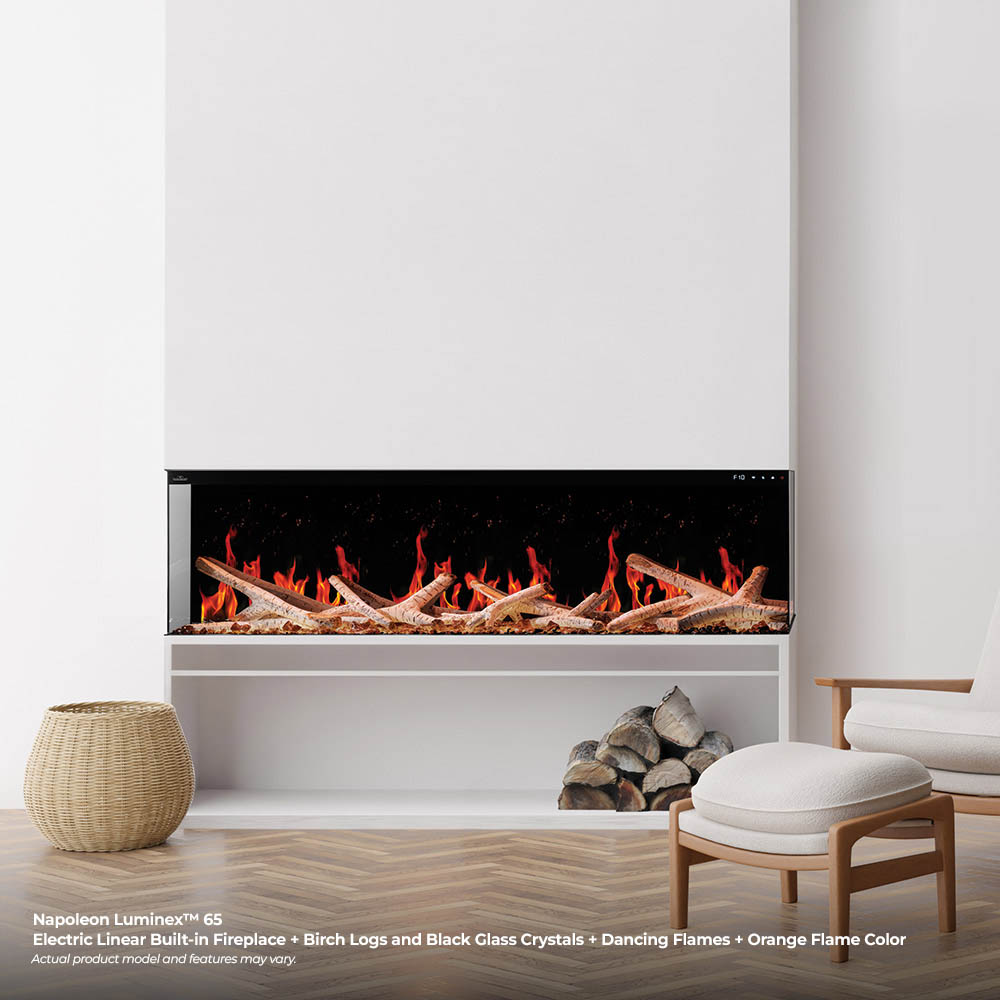 Built-in linear electric fireplace with orange flames and a log-and-ember bed