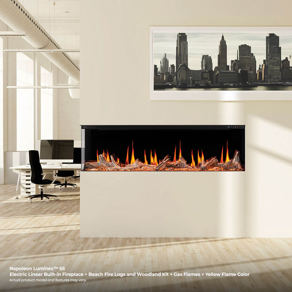 Wall-mounted linear electric fireplace with orange flames in a white interior