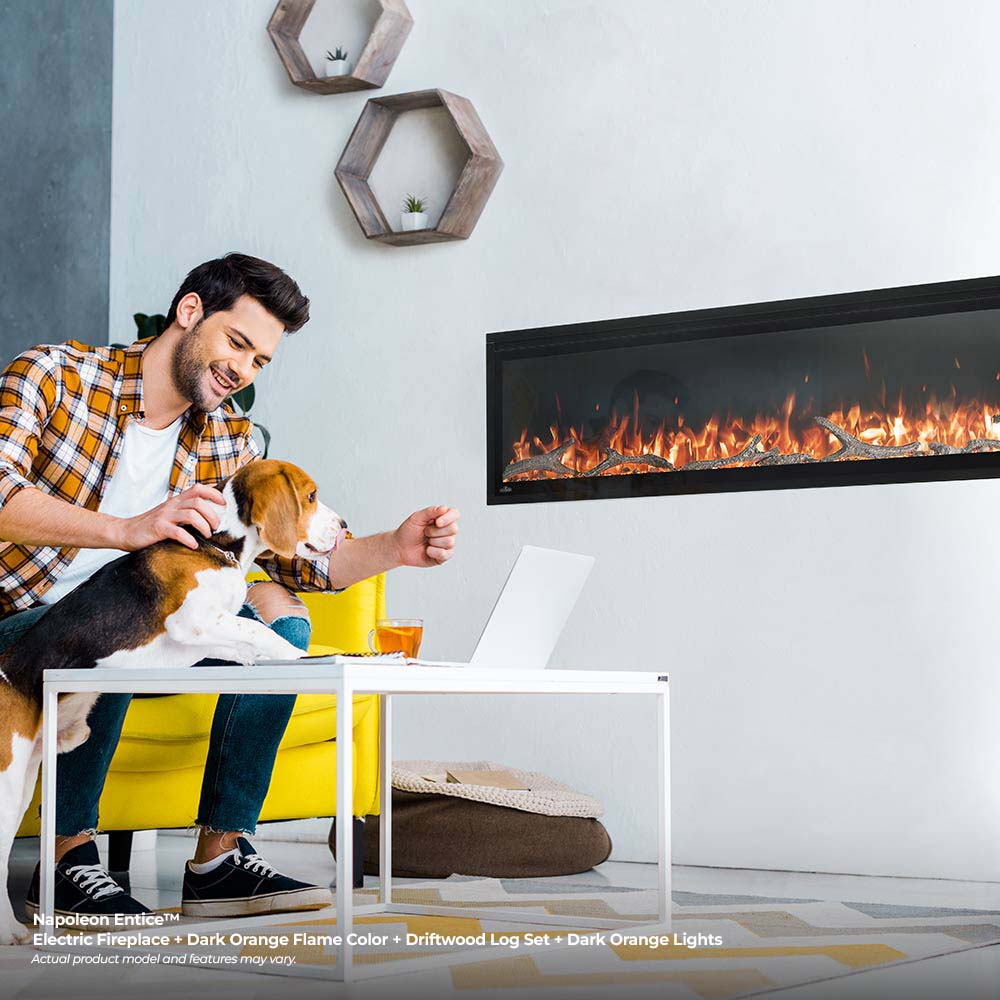 Black electric fireplace with red flame effect behind glass in living room