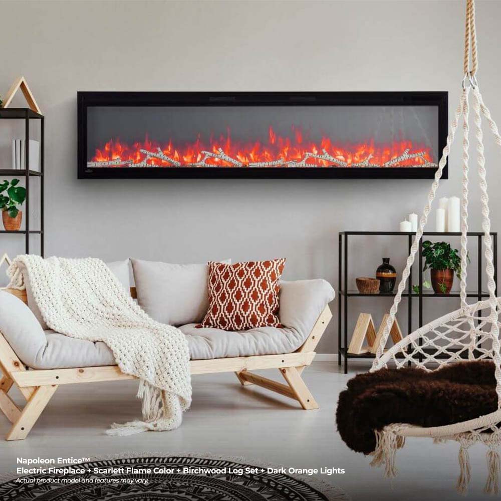 Black electric fireplace in wall frame with vivid red flame effect behind glass