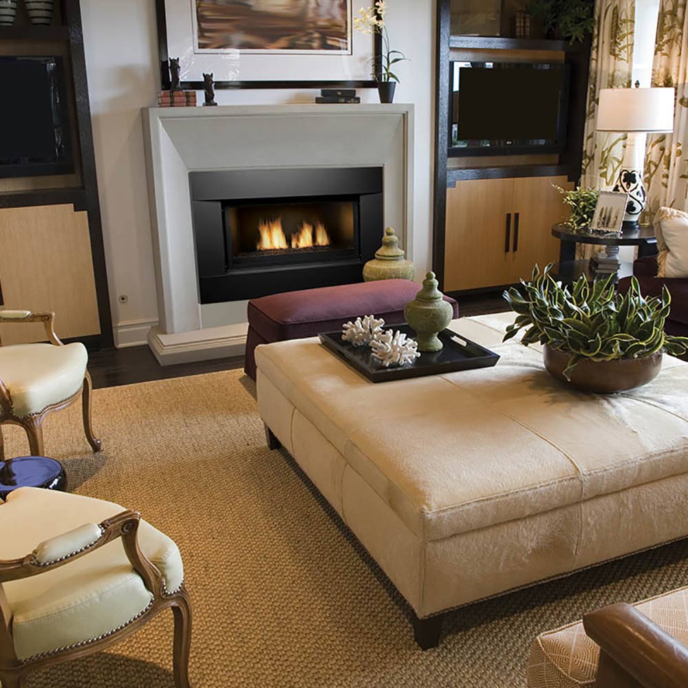 Built-in gas fireplace with black firebox and visible flames, gray surround frame