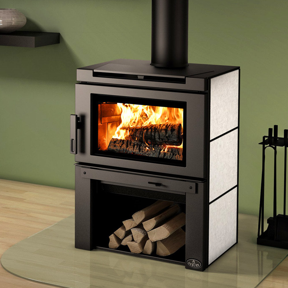 Black wood stove with glass firebox, soap stone side panels, and chimney pipe