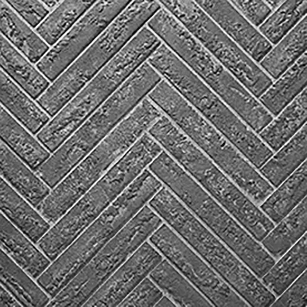 Grey herringbone refractory panel with interlocking chevron pattern