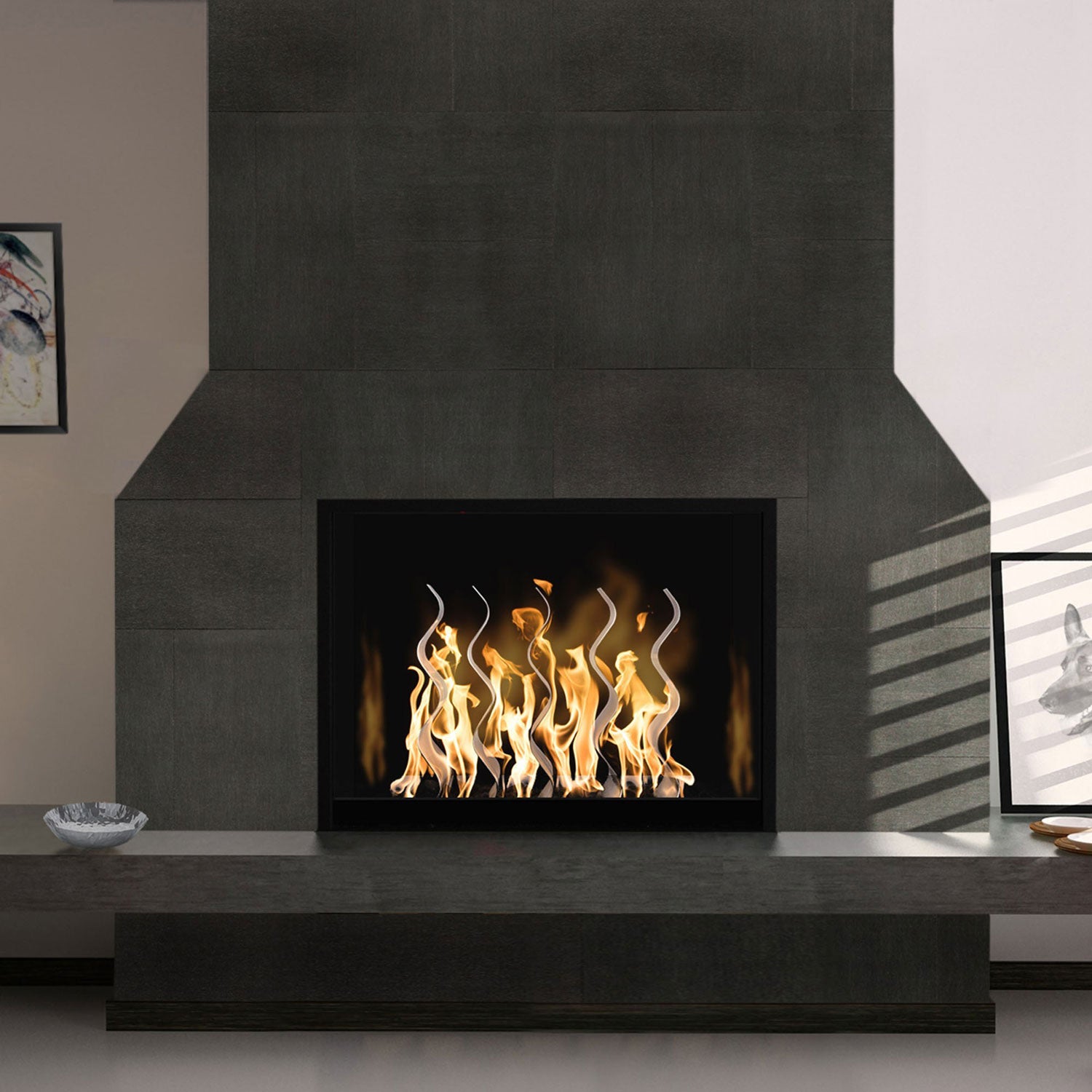 Outdoor stainless steel fireplace with open flame in a dark firebox