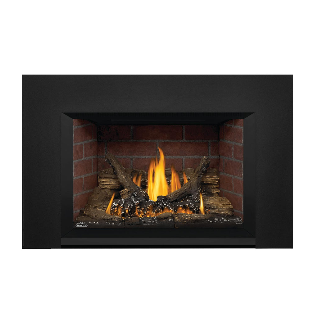 Direct vent gas fireplace insert front view with dark surround and burning firebed