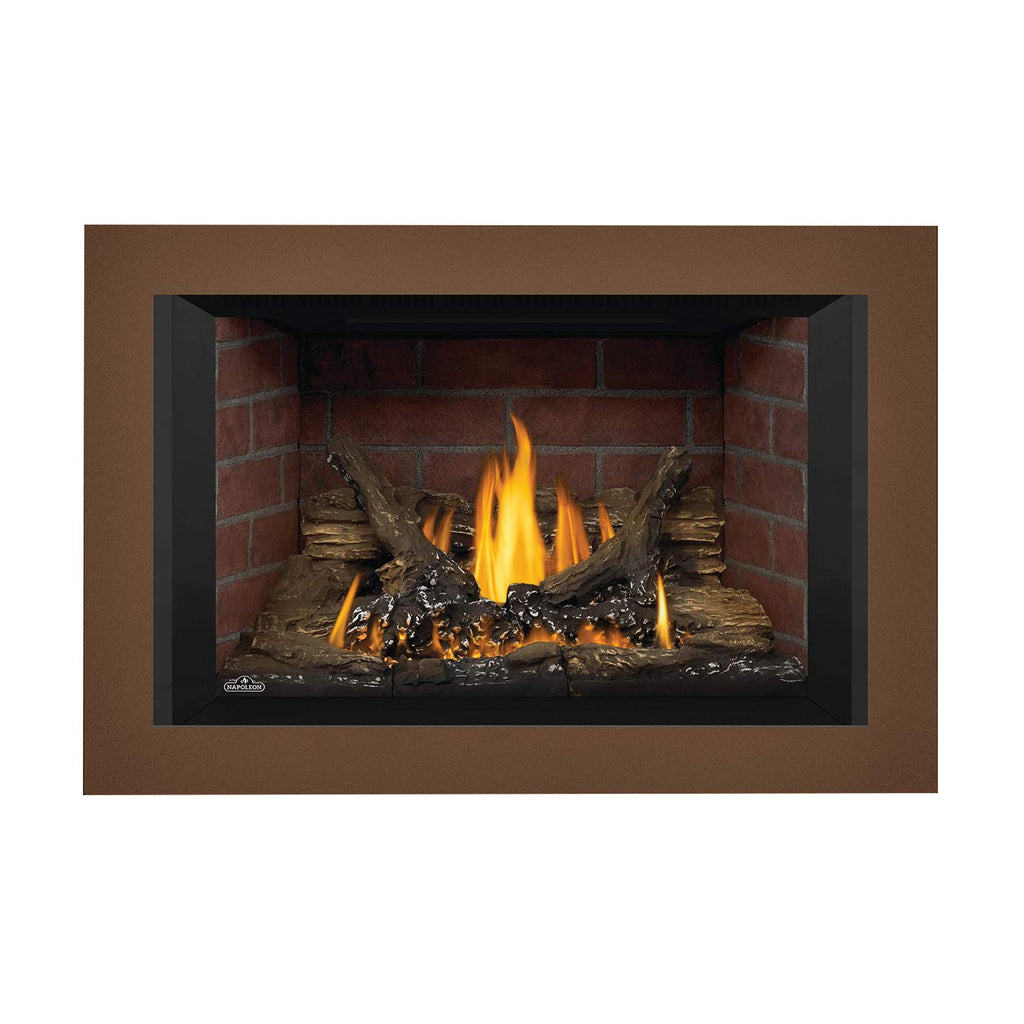 Gas fireplace insert with brown surround, brick interior, burning flames, and log set.
