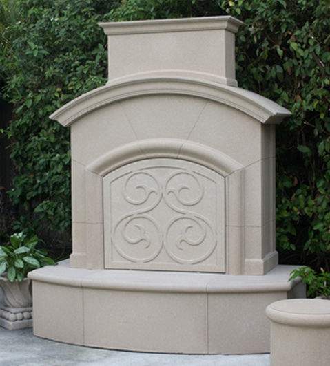 Cafe blanco fireplace protector plate with arched relief scroll design on fireplace