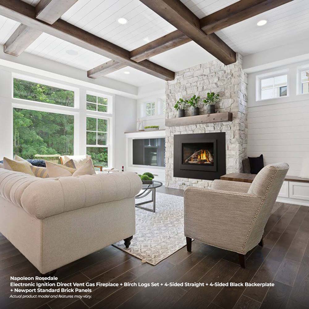 Direct vent gas insert fireplace with black frame in a stone feature wall
