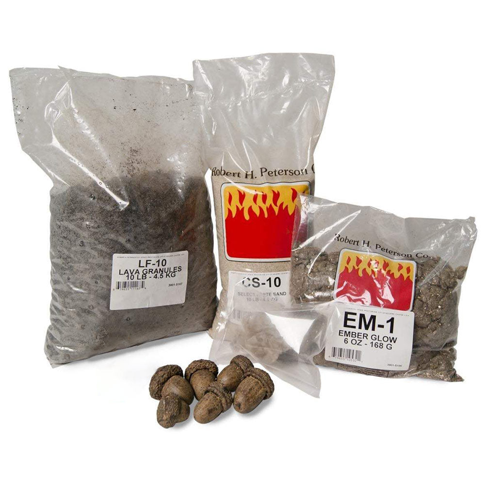 Fire pit refresh kit with labeled foil pouches and dark fuel pellets