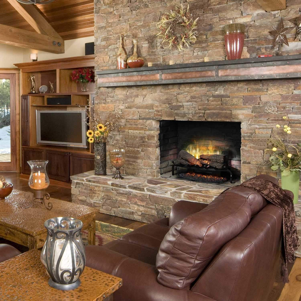 Dimplex Revillusion electric logs in a stone fireplace in a living room