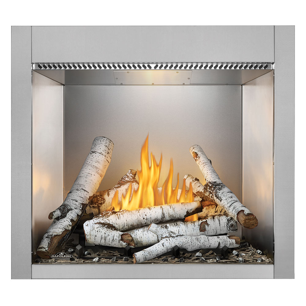 Outdoor gas fireplace with flames and white birch-style log set in stainless surround