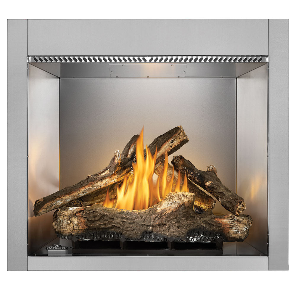 Napoleon Riverside outdoor gas fireplace with burning oak-style logs
