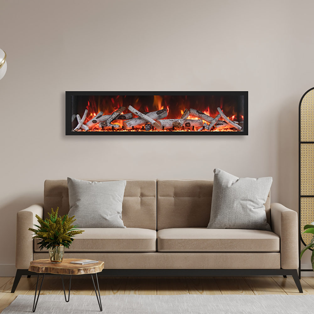 Black-framed built-in electric fireplace in wall opening with flame display