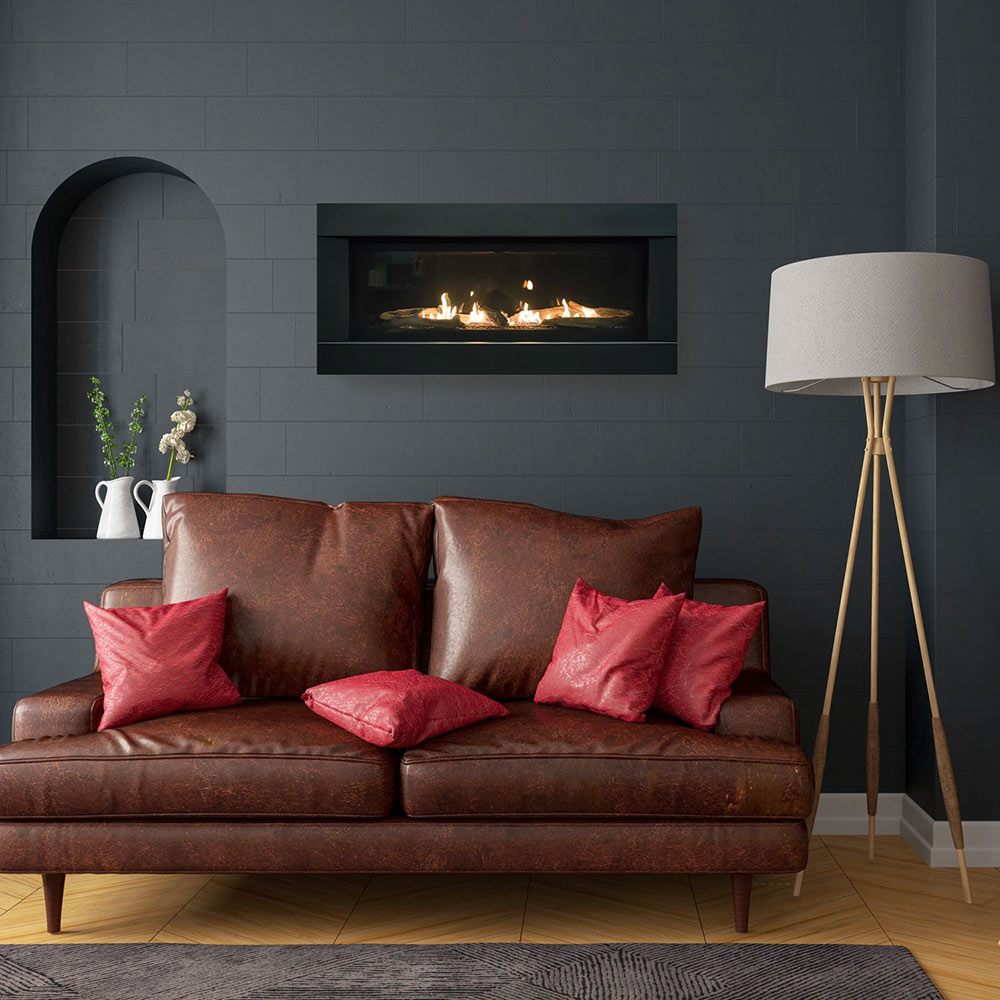 Built-in linear gas fireplace with glowing flames, set in black wall niche