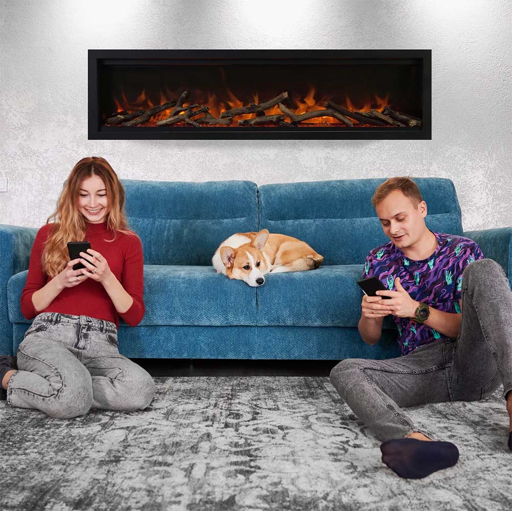 Built-in electric fireplace insert with glowing orange flame effect above a sofa