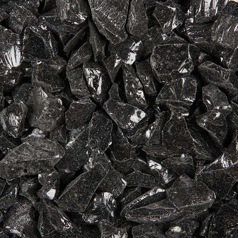 Black fire glass rocks with reflective silver highlights