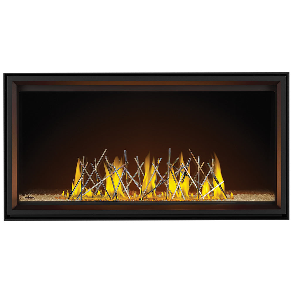 Linear direct vent fireplace with black frame and flames over glass-ember bed
