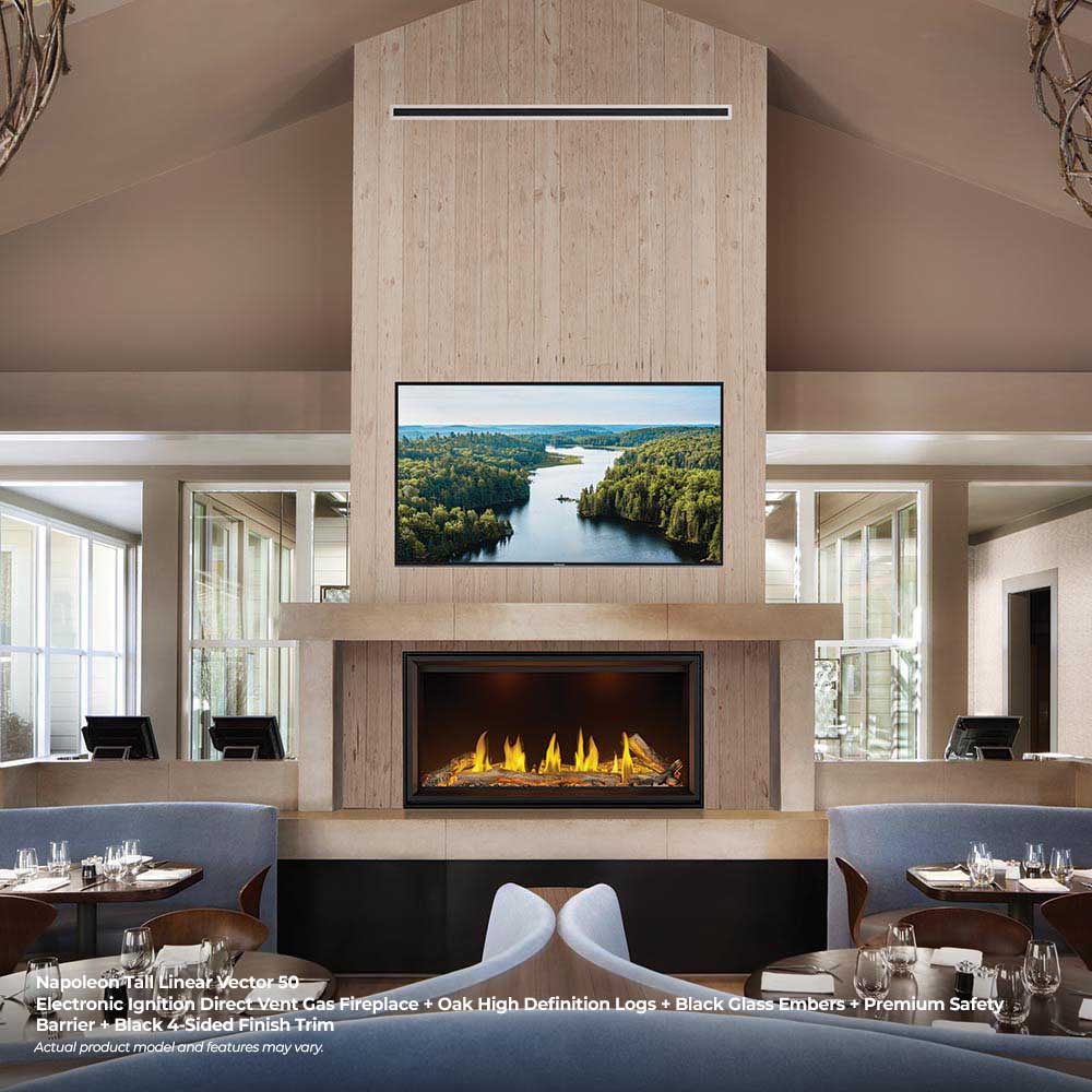 Linear direct vent gas fireplace insert in light wood surround with burning flames