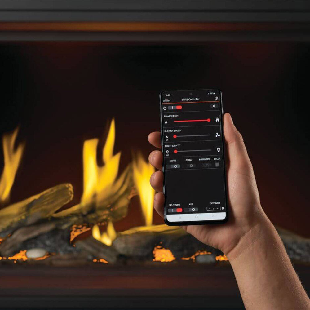 Smartphone remote app controlling linear gas fireplace with glowing flames