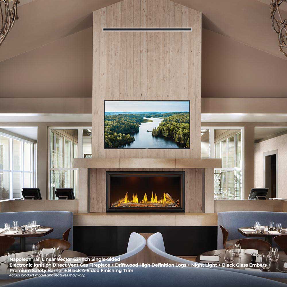 Black linear gas fireplace with burning log bed and modern trim in a wall opening