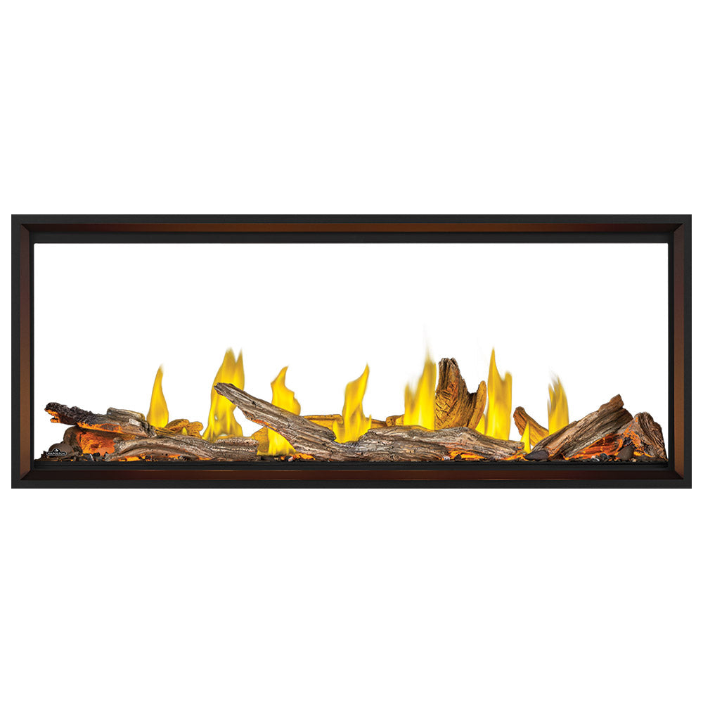 Linear see-through gas fireplace with burning wood-look logs and ember bed