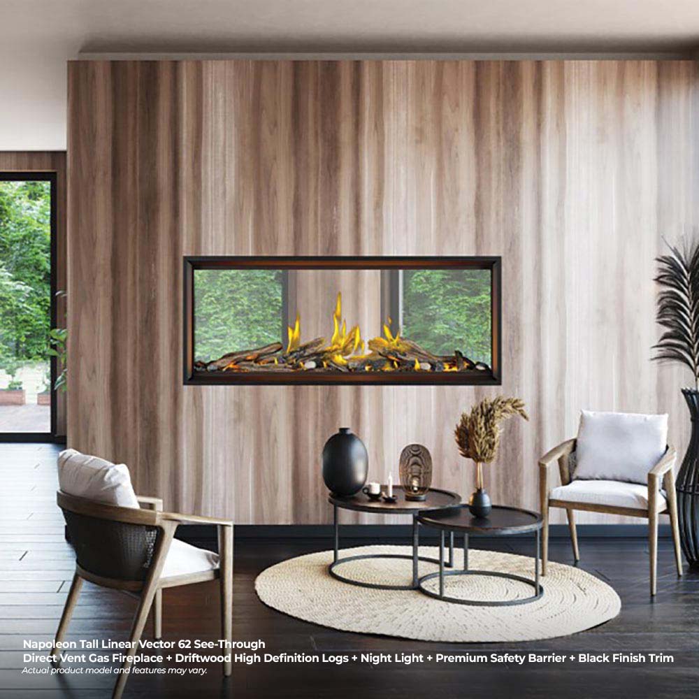 Linear see-through gas fireplace with burning logs framed in black surround