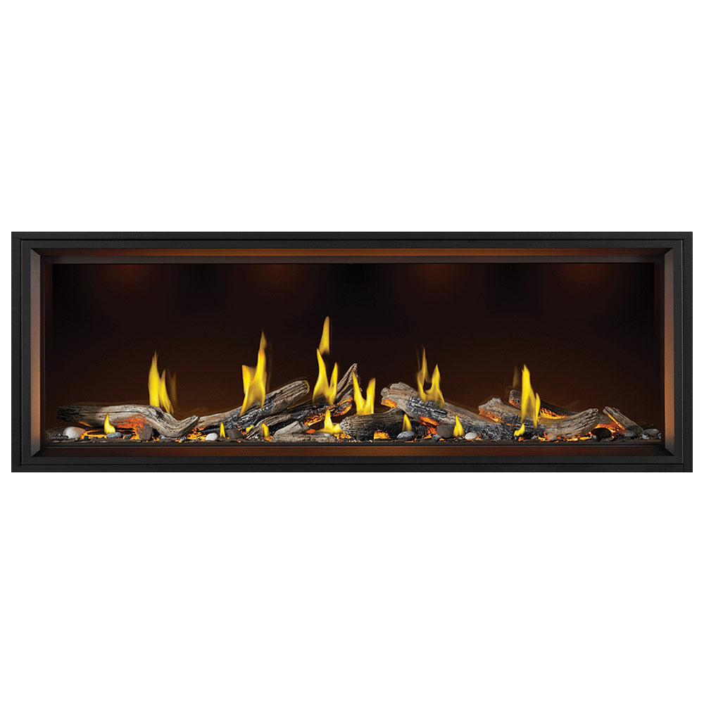 Linear gas fireplace displaying glowing flames over a log bed with black frame