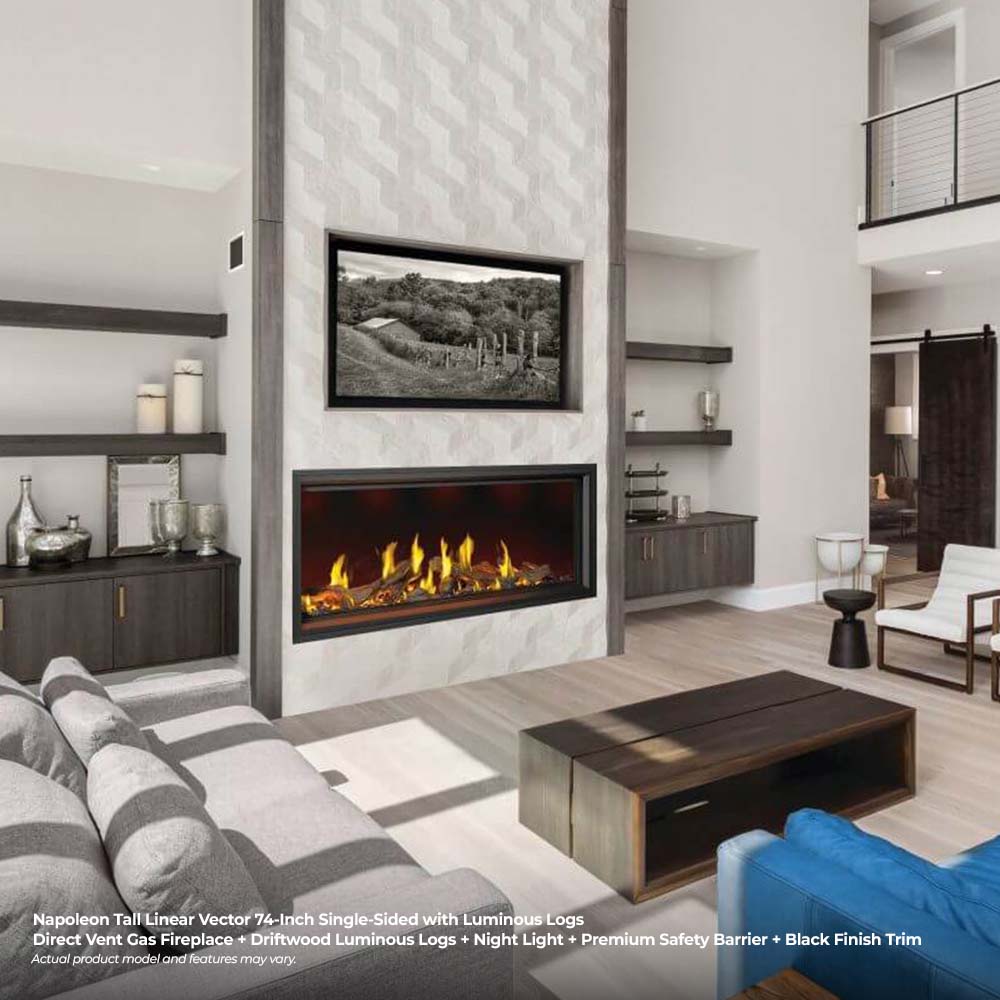 Tall linear direct-vent gas fireplace with black trim and glowing log flames, single-side
