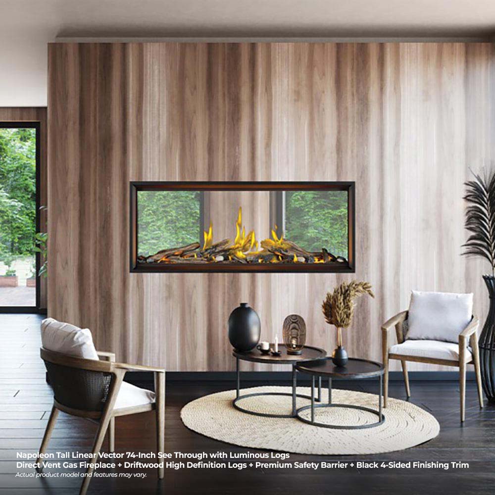 Tall linear see-through gas fireplace with glowing logs in black frame, installed