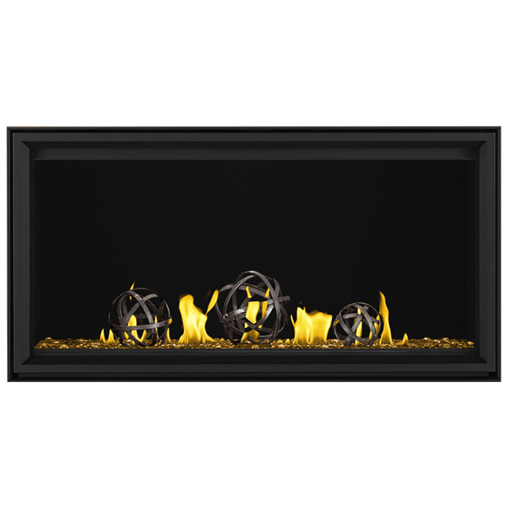 Black linear gas fireplace with glowing flames and metal globe accents on ember bed