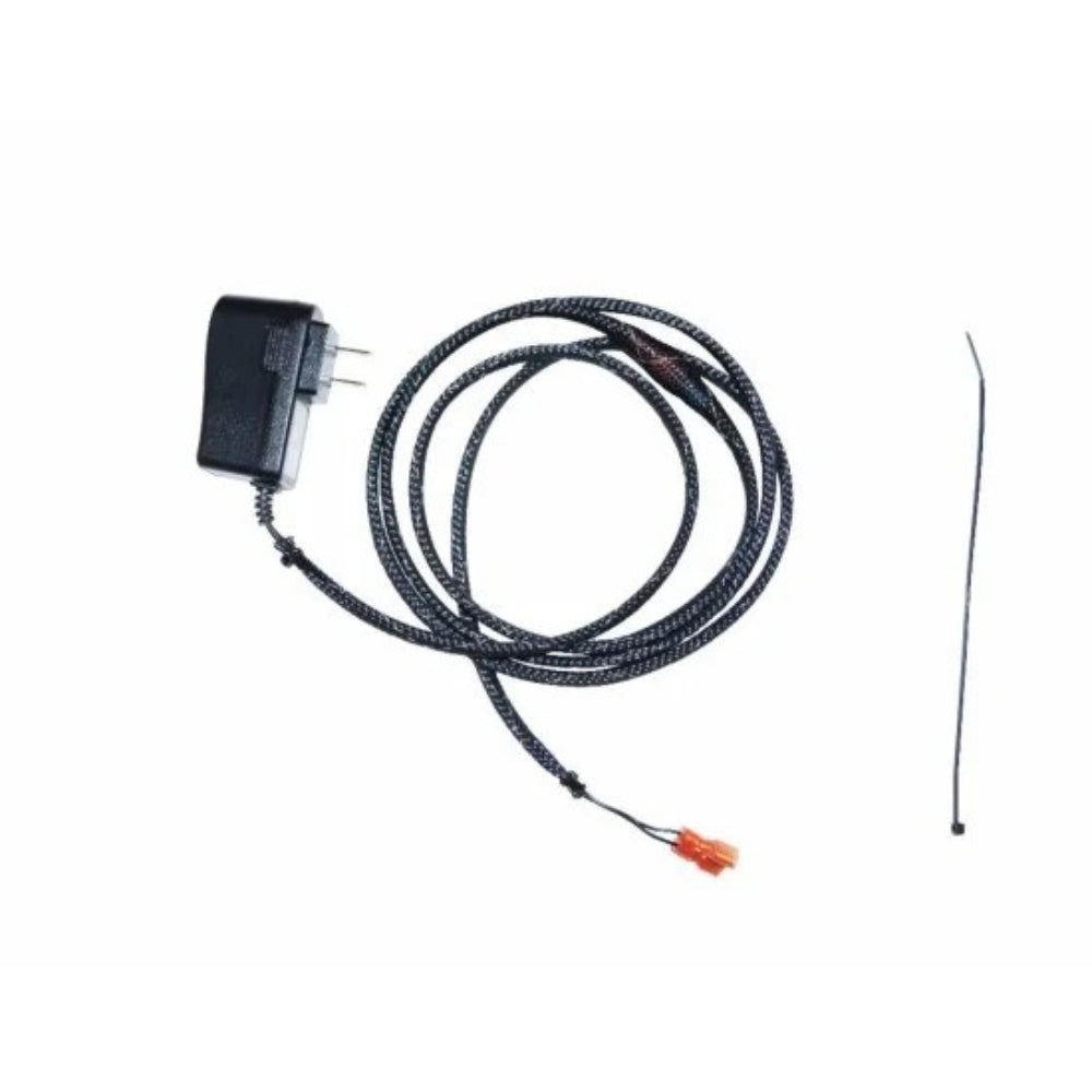 Power adapter kit with black coiled cable, plug connector, and inline DC adapter