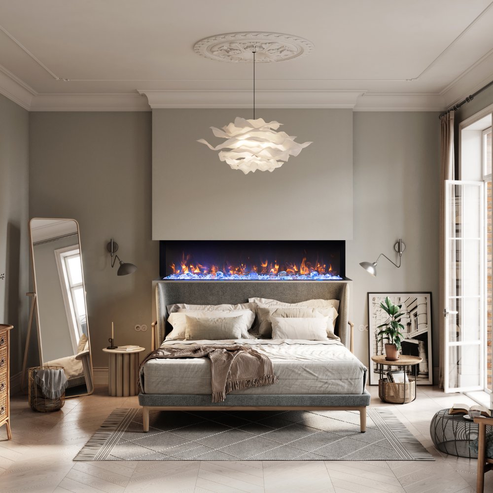 Built-in wall fireplace with glowing flames and dark trim, centered in a bedroom