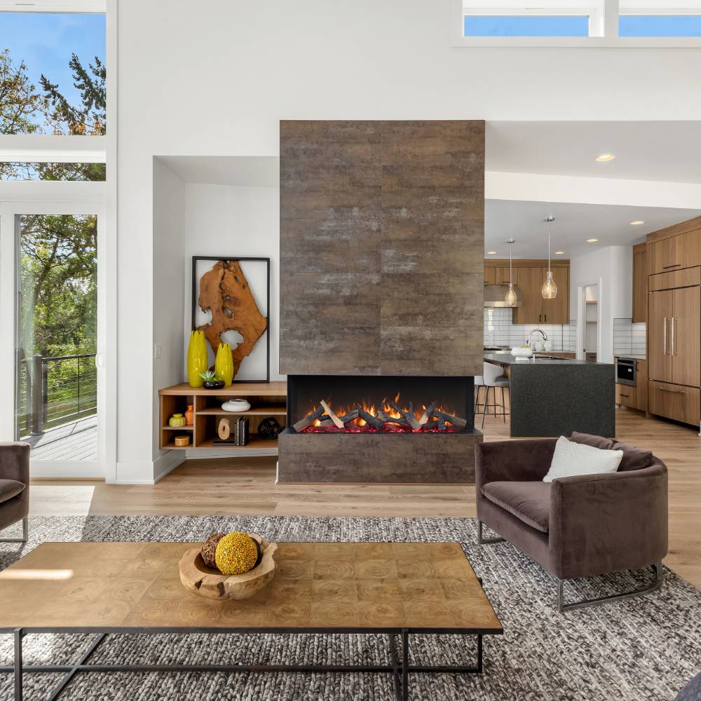 Built-in three-sided electric fireplace with glass flame view in living room