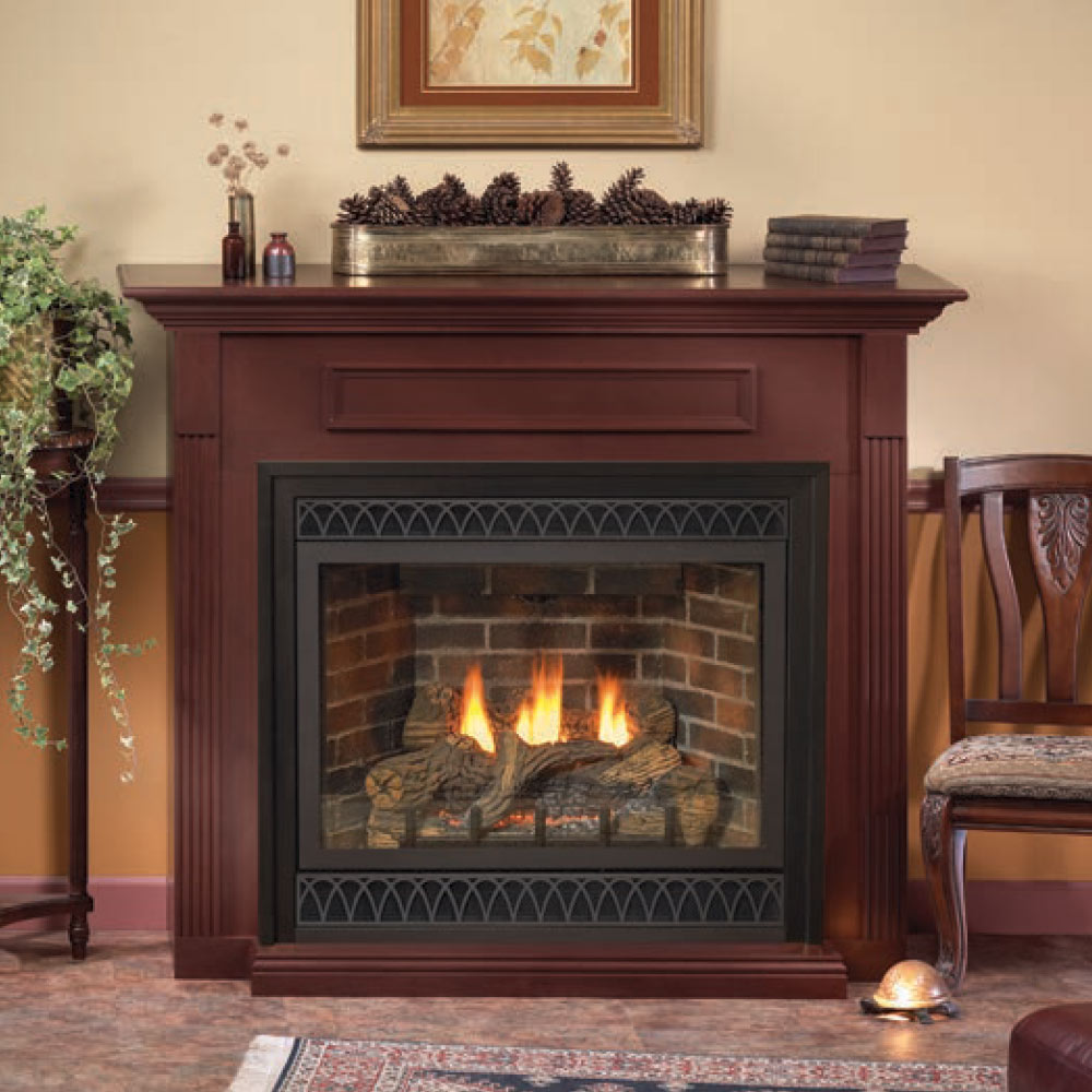 Direct vent fireplace with dark surround and glass front, showing orange flames and logs