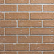 Tan brick-pattern firebox liner with speckled staggered brick blocks