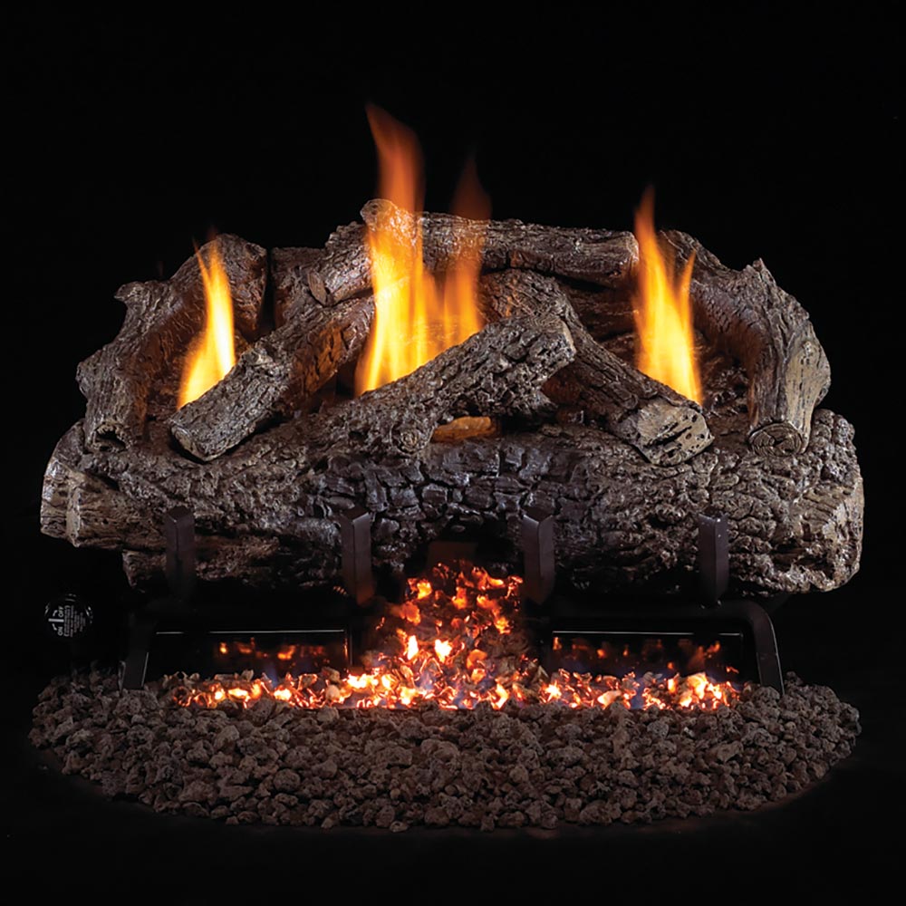 Charred oak gas log set with glowing flames and ember bed