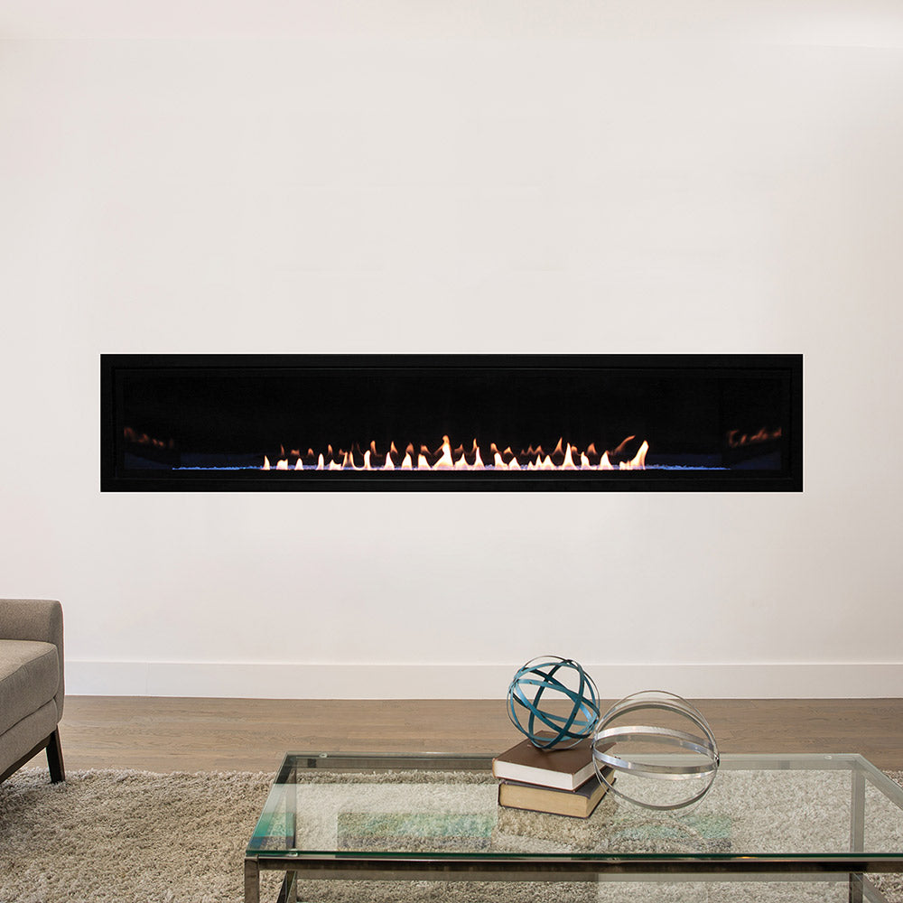 Linear ventless linear fireplace with black frame and glowing flame bed
