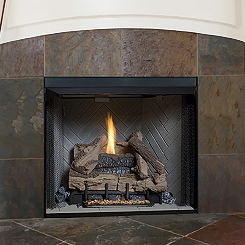 Vent-free gas log set in a black fireplace with tall flame and stacked logs