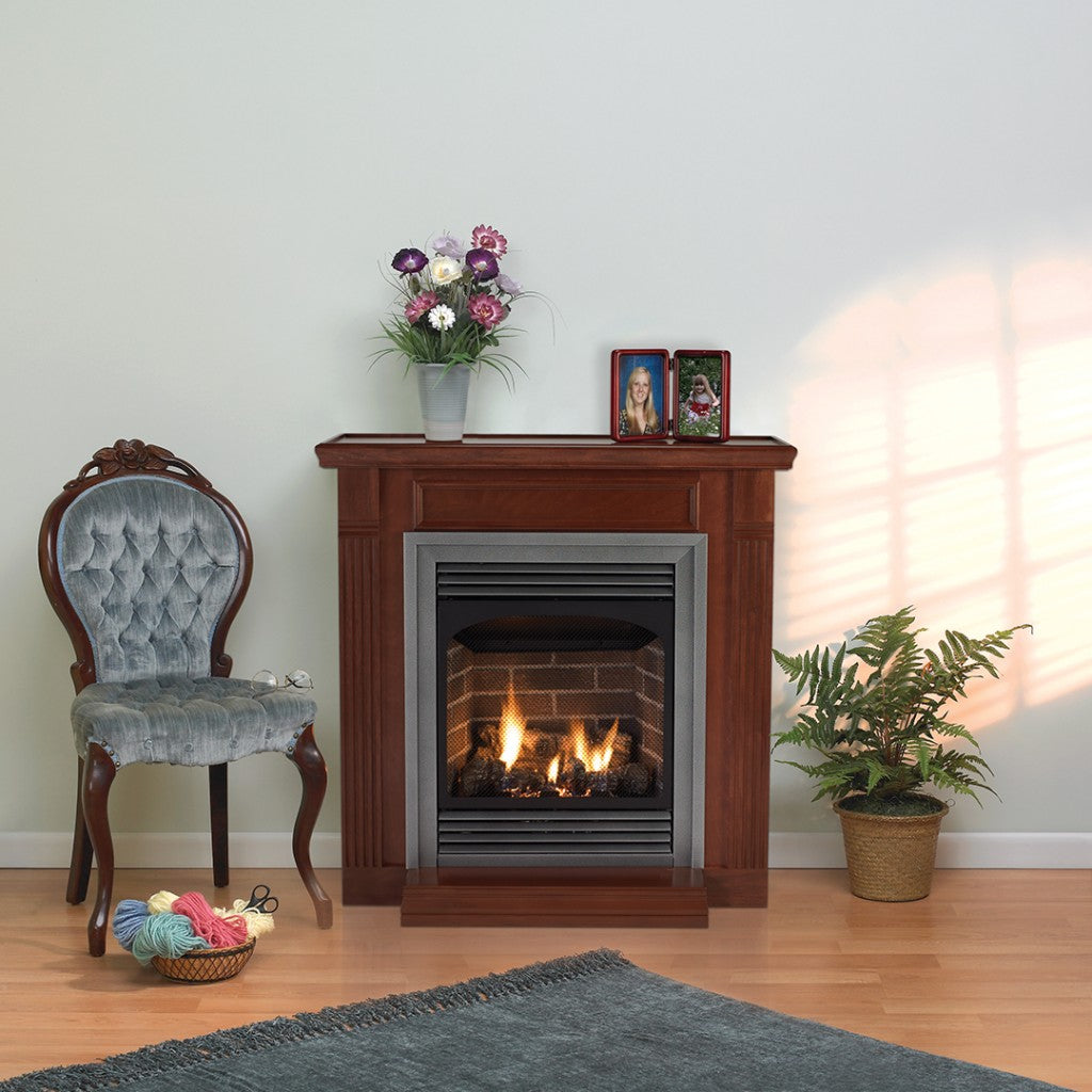 Built-in style fireplace insert with glass front and glowing burner flame