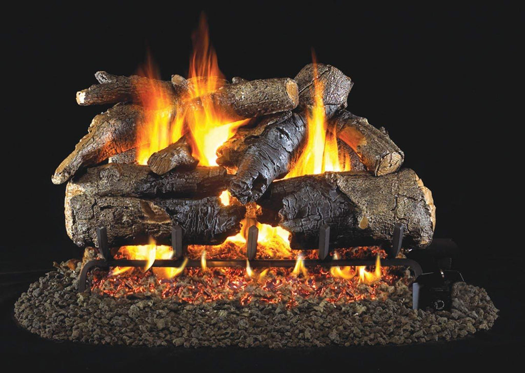 Charred oak gas log set with glowing flames in a vented burner arrangement